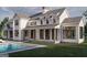 A modern farmhouse-style home with a refreshing swimming pool at 120 Godby Dr, Fayetteville, GA 30215