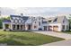 Beautiful modern farmhouse with a well-manicured lawn and a three-car garage at 120 Godby Dr, Fayetteville, GA 30215