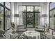 Bright sunroom featuring large windows and comfortable seating, perfect for relaxing and enjoying the view at 120 Godby Dr, Fayetteville, GA 30215