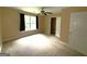 Spacious bedroom featuring neutral walls, a window for natural light, and a ceiling fan at 2841 Heritage Ln, Morrow, GA 30260