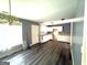 View of the kitchen area that features modern appliances and dark vinyl floors at 2841 Heritage Ln, Morrow, GA 30260