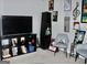 Comfortable living room featuring modern decor, a large television, and stylish furniture at 3253 Blackfoot Ln, Rex, GA 30273