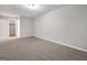 Bedroom offers neutral paint and carpet and features a small closet at 2039 Faith Cv, Atlanta, GA 30349