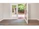 Double doors opening to the lush green outdoor scenery at 2039 Faith Cv, Atlanta, GA 30349
