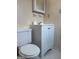This bathroom offers a white sink, toilet, and shower in a room with a light-colored paint at 5793 Springfield Pl, Ellenwood, GA 30294