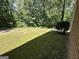 Spacious backyard with green grass at 370 Rosetta Nw Ln, Conyers, GA 30012