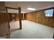 Paneled walls and carpet in the basement at 370 Rosetta Nw Ln, Conyers, GA 30012
