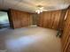 Finished basement offers paneled walls and ceiling fan at 370 Rosetta Nw Ln, Conyers, GA 30012
