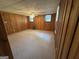 Finished basement featuring paneled walls and carpet at 370 Rosetta Nw Ln, Conyers, GA 30012