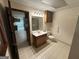 Bathroom features tile flooring, sink and toilet at 370 Rosetta Nw Ln, Conyers, GA 30012