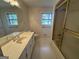 Bathroom featuring a large vanity, and a shower-tub combination at 370 Rosetta Nw Ln, Conyers, GA 30012