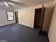 Bedroom featuring neutral walls, ceiling fan and closet at 370 Rosetta Nw Ln, Conyers, GA 30012