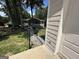 Exterior home view from garage showing stone path to front porch and side yard at 370 Rosetta Nw Ln, Conyers, GA 30012