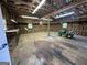 Interior of garage with a John Deere lawn mower at 370 Rosetta Nw Ln, Conyers, GA 30012