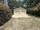 Exterior view of a two-car garage showcasing a large concrete pad at 370 Rosetta Nw Ln, Conyers, GA 30012