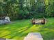 Backyard with a deck and a shed at 4157 Cedar Valley Ln, Conley, GA 30288