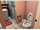 Full bathroom featuring toilet and shower stall at 4157 Cedar Valley Ln, Conley, GA 30288