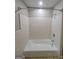 Bathroom featuring a white tiled shower and tiled floors at 4157 Cedar Valley Ln, Conley, GA 30288