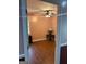 Bright bedroom with hardwood floors and a ceiling fan at 4157 Cedar Valley Ln, Conley, GA 30288