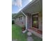 Welcoming front porch with brick accents, patterned tile, and a decorative security door at 4157 Cedar Valley Ln, Conley, GA 30288