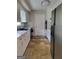 Traditional kitchen with white cabinets and a stainless steel refrigerator at 4157 Cedar Valley Ln, Conley, GA 30288