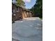 Spacious concrete patio area next to brick house at 4157 Cedar Valley Ln, Conley, GA 30288