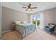 Bedroom with lake views from a large window and a cozy blue chair at 3222 Bay View Dr, Jonesboro, GA 30236