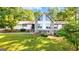 Picturesque home showcasing a stone facade, complemented by a well-maintained lawn at 3222 Bay View Dr, Jonesboro, GA 30236