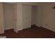 Bedroom with wood floors and multiple closets for ample storage space at 1308 Camelot Dr, South Fulton, GA 30349