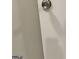 Close up of door handle and gray wall at 225 Bell St, Covington, GA 30016