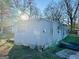 Exterior of a mobile home showing its siding and the surrounding yard at 225 Bell St, Covington, GA 30016
