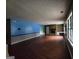 A spacious living room with hardwood floors and a stone fireplace feature at 6679 Cameron Rd, Morrow, GA 30260