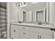 Bathroom features a modern double sink vanity and a shower-tub combo at 211 Beavers Rd, Grantville, GA 30220