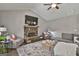 Inviting living room boasts a stone fireplace, vaulted ceilings, and comfortable seating arrangement at 211 Beavers Rd, Grantville, GA 30220