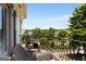 Scenic balcony with wicker seating and views of the neighborhood landscape at 30 Dorset Ct, Sharpsburg, GA 30277