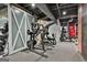 Basement gym featuring a variety of workout equipment, creating a convenient and private fitness space at 30 Dorset Ct, Sharpsburg, GA 30277