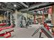 Basement gym featuring weightlifting equipment, offering a convenient and private fitness space at 30 Dorset Ct, Sharpsburg, GA 30277