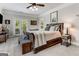 Bedroom suite boasting french doors with a seating nook and view at 30 Dorset Ct, Sharpsburg, GA 30277