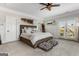 Well-appointed bedroom with a plush bed, stylish decor, and access to a balcony at 30 Dorset Ct, Sharpsburg, GA 30277