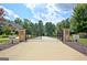 Entrance gate to amenities for residents only, and long drive way at 30 Dorset Ct, Sharpsburg, GA 30277