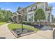Elegant brick home with stone accents, manicured lawn, and decorative balcony at 30 Dorset Ct, Sharpsburg, GA 30277