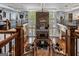 Soaring great room with stone fireplace and natural light from oversized windows at 30 Dorset Ct, Sharpsburg, GA 30277