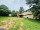 The backyard has a wooden deck with stairs at 1766 Tilden Ave, Jonesboro, GA 30236