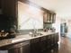 Modern kitchen featuring granite countertops and stainless steel appliances at 1766 Tilden Ave, Jonesboro, GA 30236
