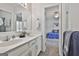 Bright bathroom featuring double sinks and vanity with tile flooring at 106 Lanyard Bnd, Peachtree City, GA 30269