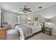 Bedroom featuring neutral colors, a ceiling fan, and comfortable textures at 106 Lanyard Bnd, Peachtree City, GA 30269