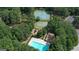 Aerial view of community tennis court, playground, basketball court and pool at 115 Sunderland Cir, Fayetteville, GA 30215