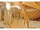 Unfinished attic with exposed ductwork, rafters and HVAC system at 115 Sunderland Cir, Fayetteville, GA 30215