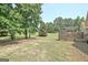 Wide-open backyard with a fenced in area at 115 Sunderland Cir, Fayetteville, GA 30215