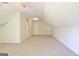 Spacious carpeted bonus room with a ceiling fan and entrance to bathroom at 115 Sunderland Cir, Fayetteville, GA 30215
